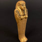 Unique Ancient Egyptian Gilded Ushabti Wearing a tripartite Wig Statue