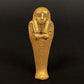 Unique Ancient Egyptian Gilded Ushabti Wearing a tripartite Wig Statue