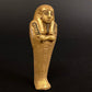 Unique Ancient Egyptian Gilded Ushabti Wearing a tripartite Wig Statue