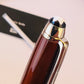 Two Montblanc Meisterstuck Solitaire Citrine Classique Ballpoint And Rollerball Set