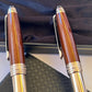 Two Montblanc Meisterstuck Solitaire Citrine Classique Ballpoint And Rollerball Set
